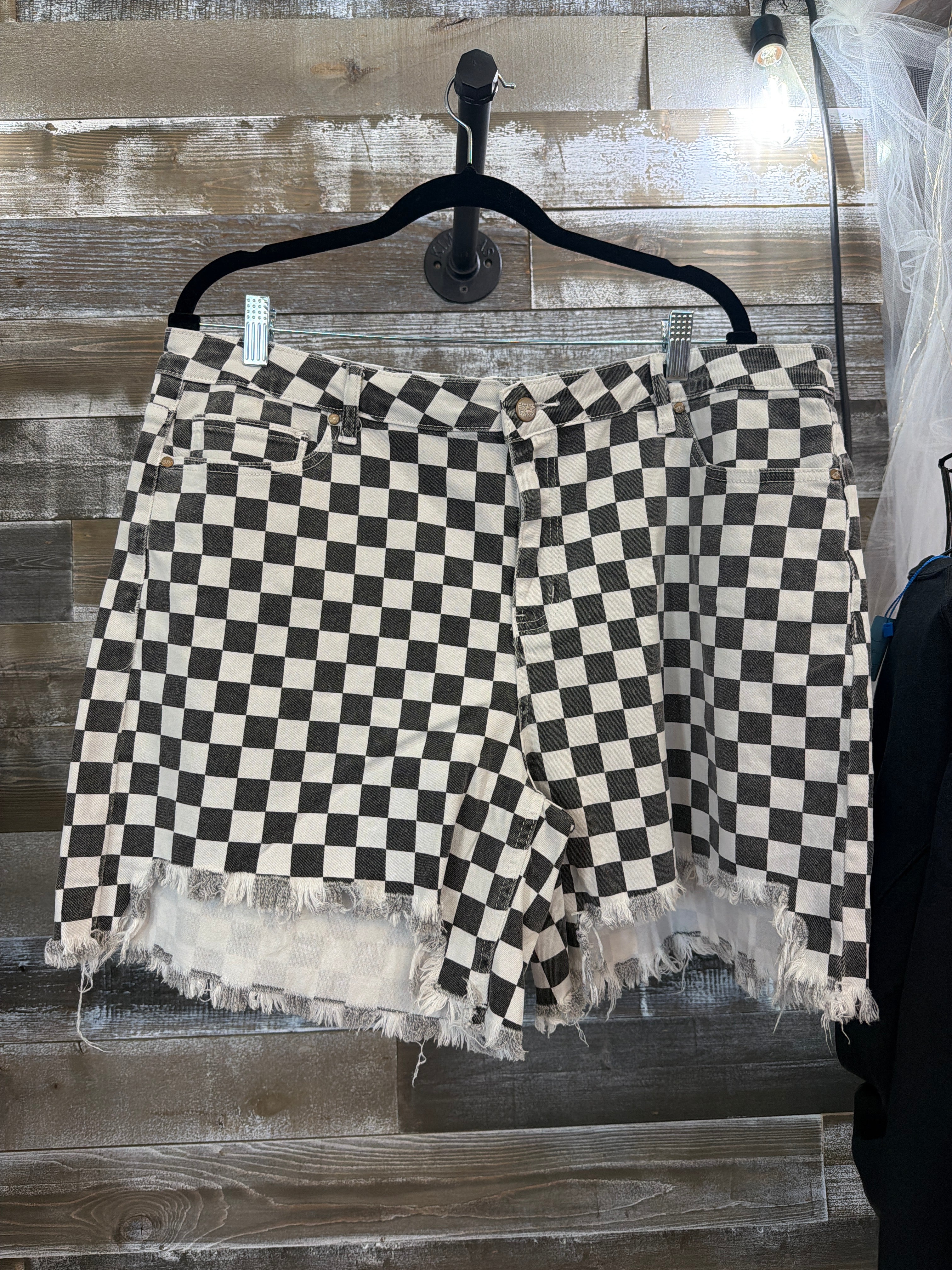 Distressed checkered shorts